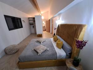 Villas VILLA AU COEUR DE L'HERAULT AVEC PISCINE ET SAUNA : photos des chambres