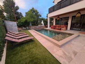 Villas VILLA AU COEUR DE L'HERAULT AVEC PISCINE ET SAUNA : photos des chambres