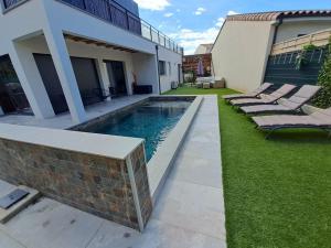 Villas VILLA AU COEUR DE L'HERAULT AVEC PISCINE ET SAUNA : photos des chambres