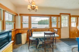 Waterfront Gray Home with Furnished Deck and Fire Pit!