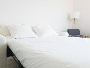 Appartements EXIGEHOME-Appartement neuf tres lumineux a 15 min de Paris : photos des chambres