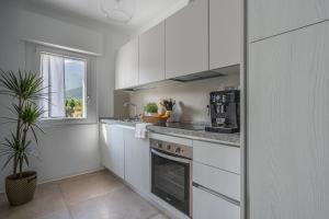 Casa al Lago di TSS - Ampio Giardino Fronte al Lago - Perfetto per Famiglie e Gruppi a Calceranica al Lago