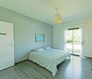 Maisons de vacances Villa Blanca - Maison climatisee piscine privee : photos des chambres