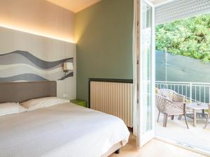 Chambre Triple avec Balcon