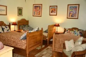 Triple Room Bed and Breakfast main House - Calibishie