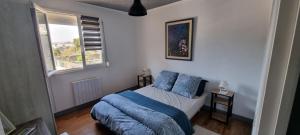 Appartements Sejour dans la ville bleue : photos des chambres