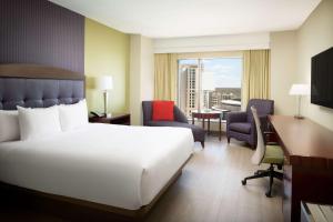 King Room with City View and Roll-in Shower - Mobility and Hearing Access room in Hilton Charlotte Uptown