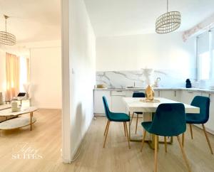 Appartements Blooming Suites : photos des chambres