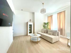 Appartements Blooming Suites : photos des chambres