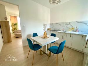 Appartements Blooming Suites : photos des chambres