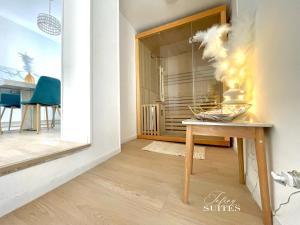 Appartements Blooming Suites : photos des chambres