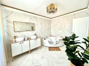 Appartements Blooming Suites : photos des chambres