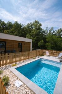 Villas MAISON ECOLOGIQUE 65m2/PISCINE PRIVATIVE ET ESPACE VERT/ARDECHE : photos des chambres