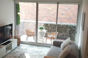 Cosy Beach Apartment with Free Secure Car Park