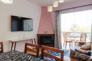 Apto com lareira elétrica perto do Pico do Imbiri