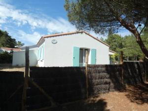 Maisons de vacances Maison 5 pers a Notre-Dame-de-Monts, a 150m des plages, avec jardin et parking - FR-1-540-269 : photos des chambres