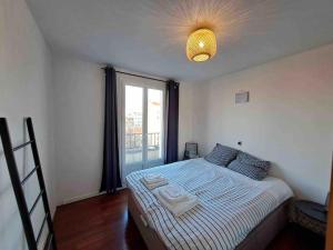 Appartements Cosy apartment with View ! Paris 10mn by train : photos des chambres