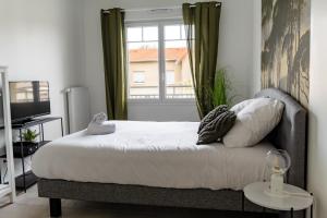 Appartements Appart Neuf, parking et plage : photos des chambres