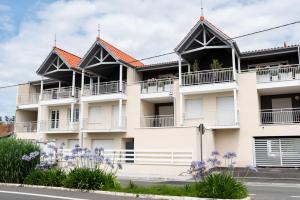 Appartements Appart Neuf, parking et plage : photos des chambres
