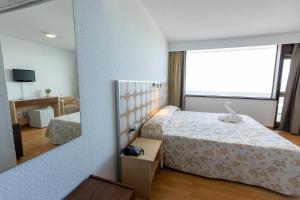 Studio (2 Adults + 1 Child) room in Hotel Flamero