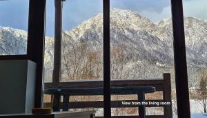 Cozy Riverfront Apartments with garden and mountain view