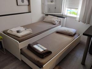 Appartements STUDCLUB studio climatise confortable face tram parking : photos des chambres