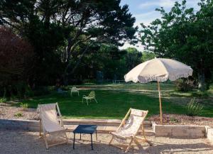 Maisons de vacances La Maison de L'Amiral, son jardin, son tennis a 7 min a pied de l'ocean : photos des chambres