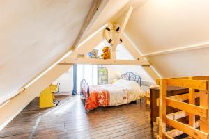 Les maisons de vacances GHK -Jardin-Wifi-parking : photos des chambres