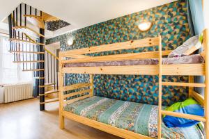 Les maisons de vacances GHK -Jardin-Wifi-parking : photos des chambres