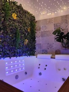 Maisons de vacances La Cabana Agreable logement avec Jacuzzi/Balneo : photos des chambres