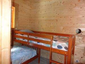 Chalets Un chalet en bois dans un ecrin de verdure : photos des chambres