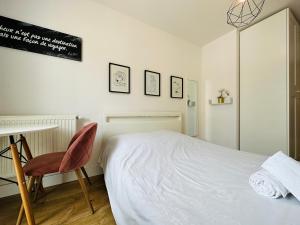 Appartements Le Vintage - T4 confortable : photos des chambres