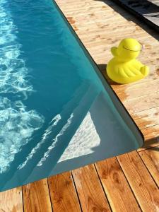 Maisons de vacances Maison Bons Jours. Grange traditionelle avec piscine : photos des chambres