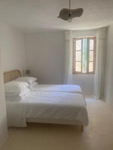 Appartements Maison au coeur du village : photos des chambres