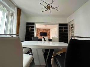 Appartements Logement tout confort avec jardin proche centre : photos des chambres