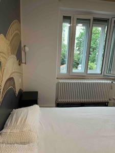 Appartements Logement tout confort avec jardin proche centre : photos des chambres