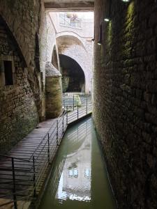 Appartements LE MATIN CALME - Charme ancien - Vue canal : photos des chambres