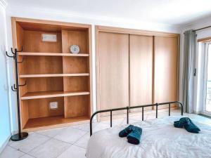 Peniche master bedroom with sea view balcony, private bathroom, shared kitchen, swimming pool, surfing resort