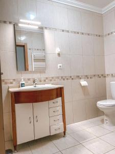 Peniche master bedroom with sea view balcony, private bathroom, shared kitchen, swimming pool, surfing resort