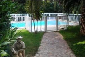 Appartements T2 avec piscine 5 mn des plages et village : photos des chambres