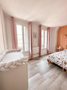 Appartements Logement entier 75 m2 : photos des chambres