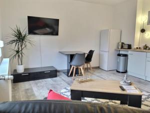 Chambre 26m - Salon et kitchenette privé - WIFI