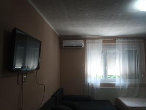 Quadruple Room with Shower room in Oázis Vendégház és Appartman