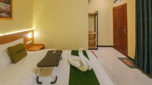 Urbanview Hotel Sakura Kampung Inggris Pare by RedDoorz