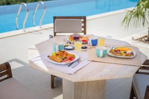 Solanas View - Ferienhäuser in ruhiger Lage, mit einer einzigartigen Aussicht, Infinity Pool, Free Parking und Wlan