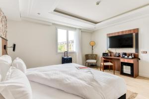 Hotels Zenitude Relais & Spa La Valadiere : Chambre Lit King-Size Deluxe