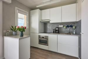 Appartements Le Tikahupo - Charmant appt vue sur le port : photos des chambres