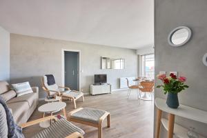 Appartements Le Tikahupo - Charmant appt vue sur le port : photos des chambres