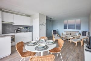 Appartements Le Tikahupo - Charmant appt vue sur le port : photos des chambres