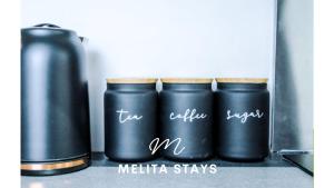 Stylish 4 bedroom home with patio garden